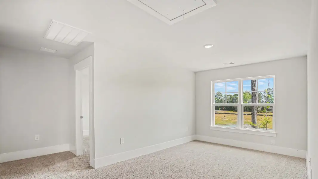 Representative unfurnished interior of a home built from the Mackenzie2 by D.R. Horton in Riverlake, Supply (Image 10).