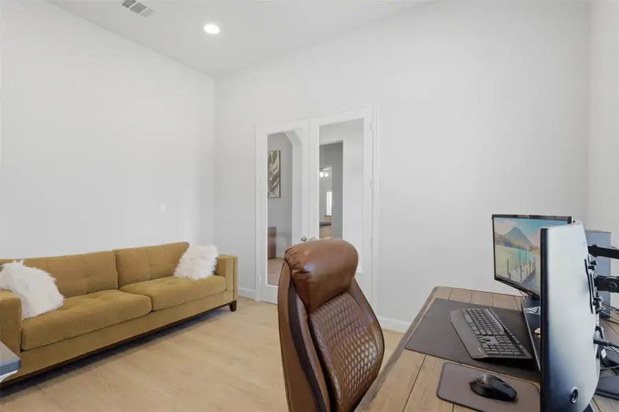The home office/study featuring French doors. The home office/study featuring French doors.