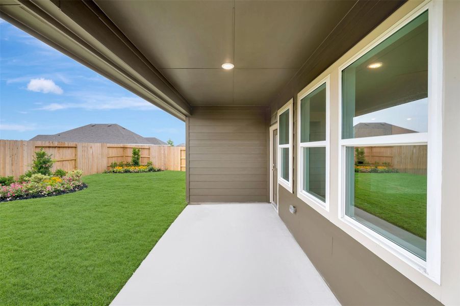 Enjoy the outdoors on the covered patio Enjoy the outdoors on the covered patio