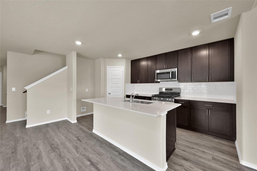 Furnished interior view inside a new home in Lakes at Black Oak, Magnolia (Image 5).