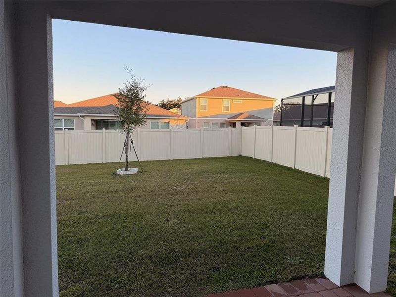 Exterior details and patio area of a home in Waterbrooke, Clermont (Image 25).