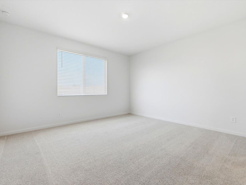 Spacious, unfurnished interior of a new home in Blossom Rock Reserve Series, Apache Junction (Image 14).