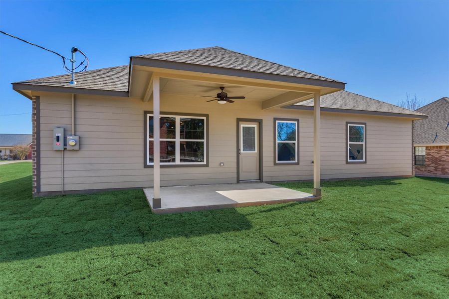 Exterior details and patio area of a home in , Willis (Image 31). Exterior details and patio area of a home in , Willis (Image 31).