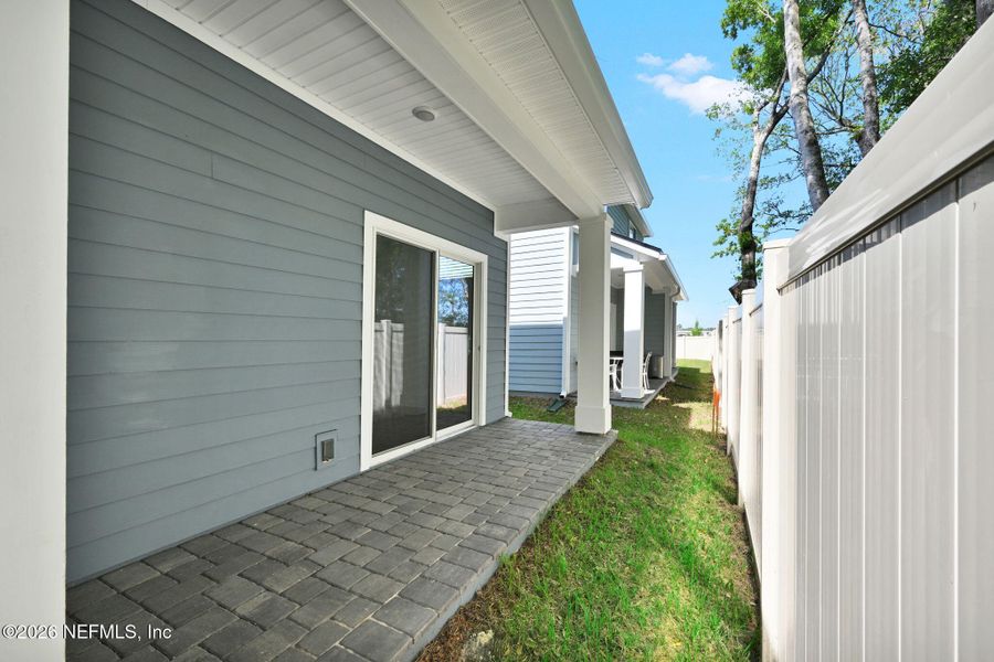 Exterior details and patio area of a home in Baxley Villas, Middleburg (Image 3).