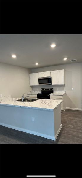 Furnished interior view inside a new home in Thomas Estates, La Grange (Image 3). Furnished interior view inside a new home in Thomas Estates, La Grange (Image 3).