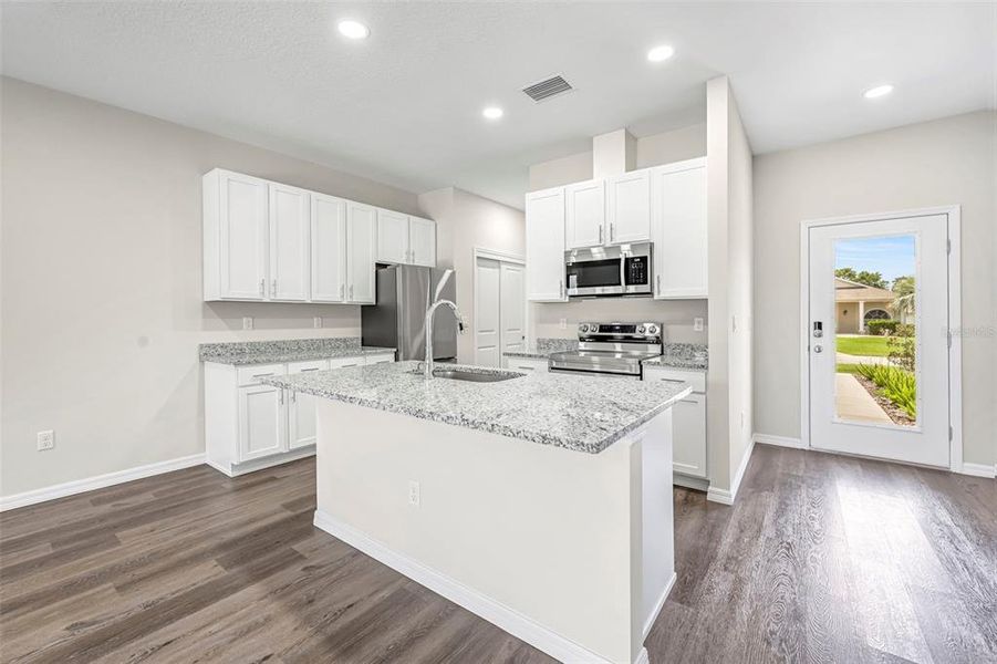 Furnished interior view inside a new home in , Weeki Wachee (Image 14).