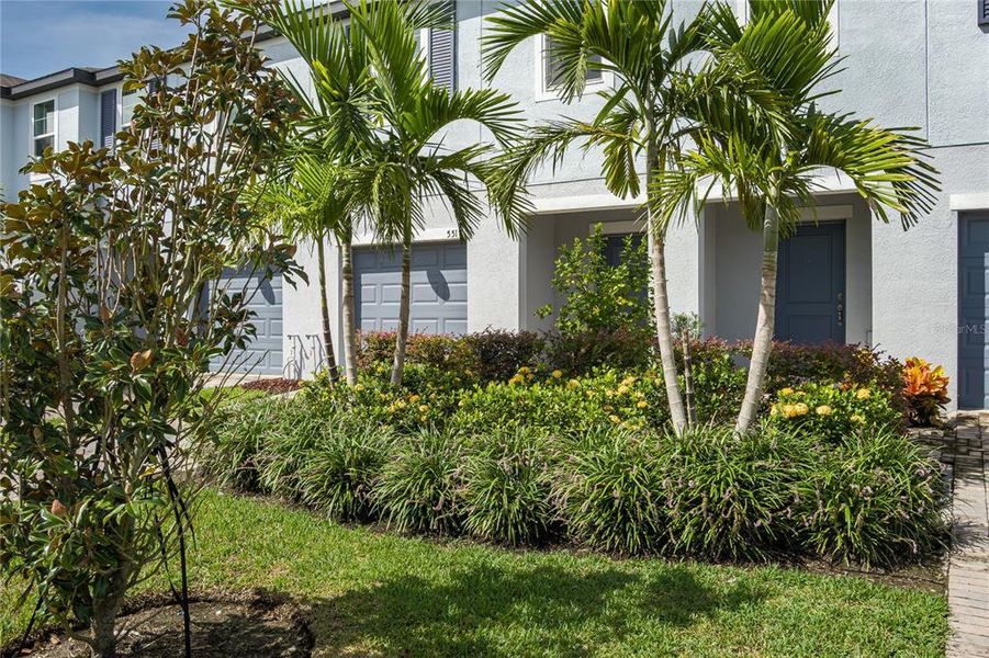 Front exterior of a new home in , Palmetto, FL, highlighting curb appeal (Image 24).