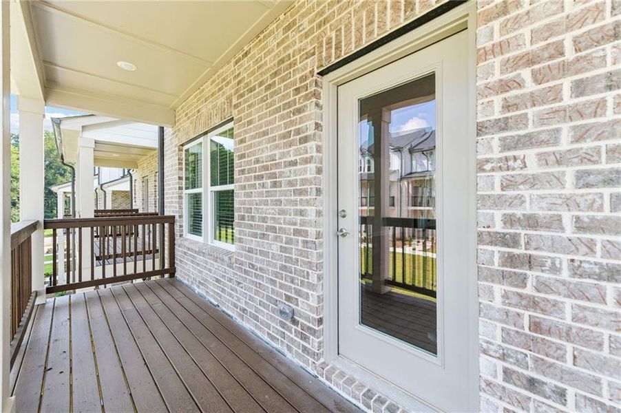 Exterior details and patio area of a home in Martin Springs - Highland Series, Lawrenceville (Image 29).