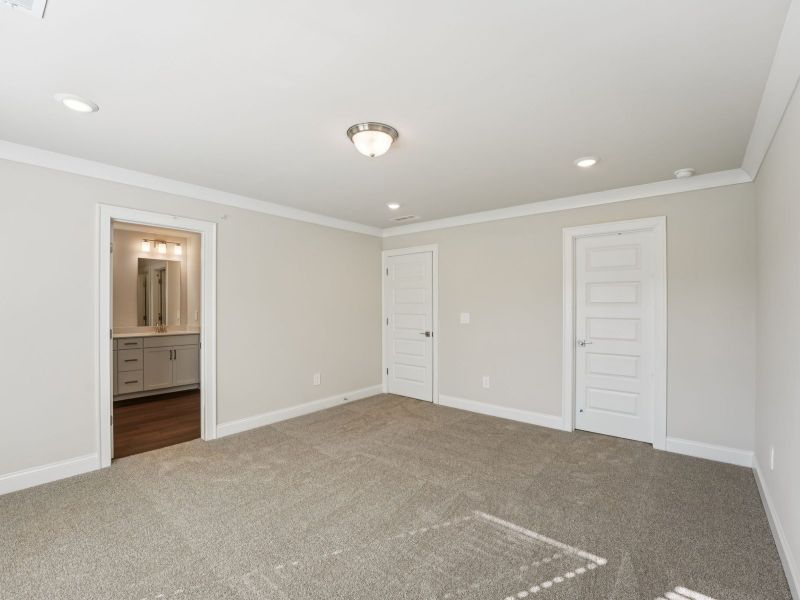 Spacious, unfurnished interior of a new home in Hemingway - Highland Series, Cumming (Image 13).