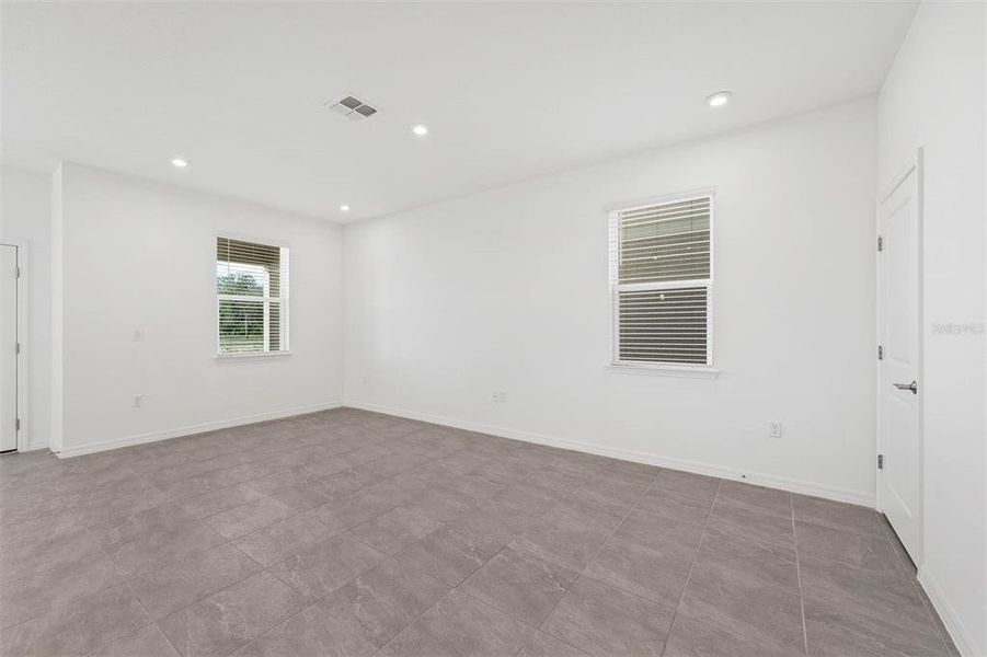 Spacious, unfurnished interior of a new home in Brack Ranch, St. Cloud (Image 29).
