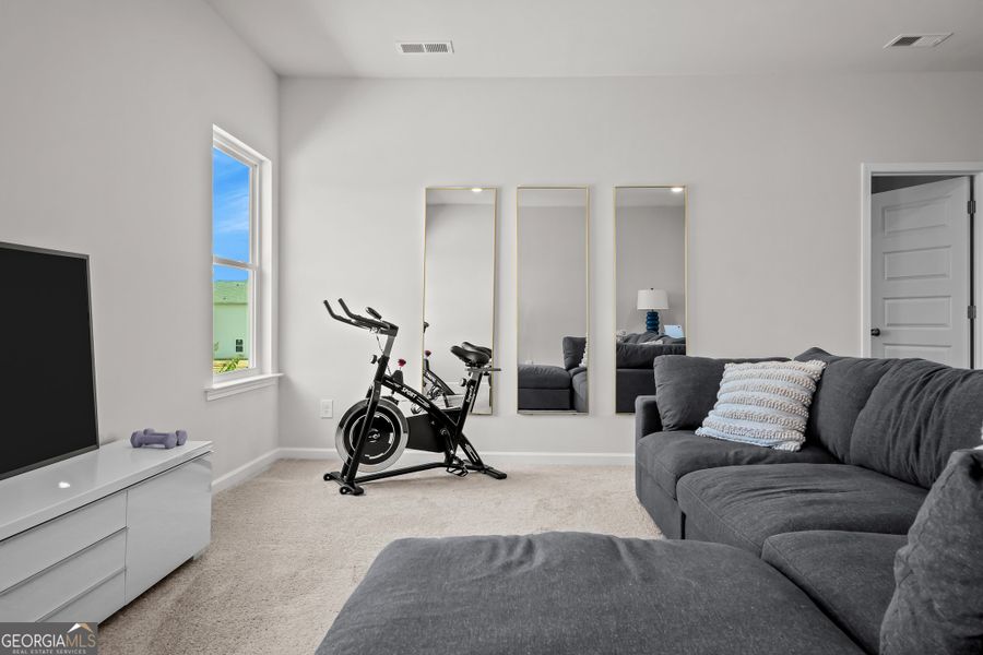 Furnished interior view inside a new home in Cobblestone Crossing Commons, Warner Robins (Image 39).