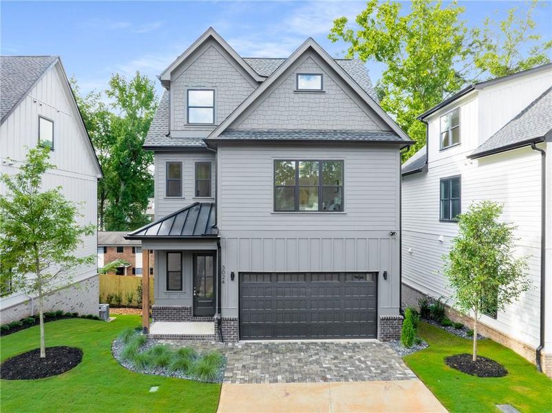 Front exterior of a new home in , Smyrna, GA, highlighting curb appeal (Image 2).