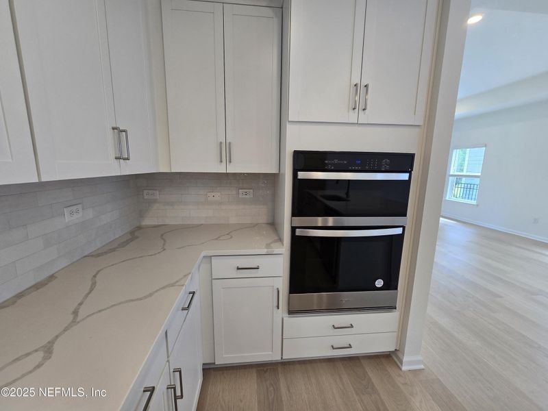 Furnished interior view inside a new home in Hyland Trail, Middleburg (Image 13).