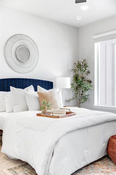 Another view of the primary bedroom