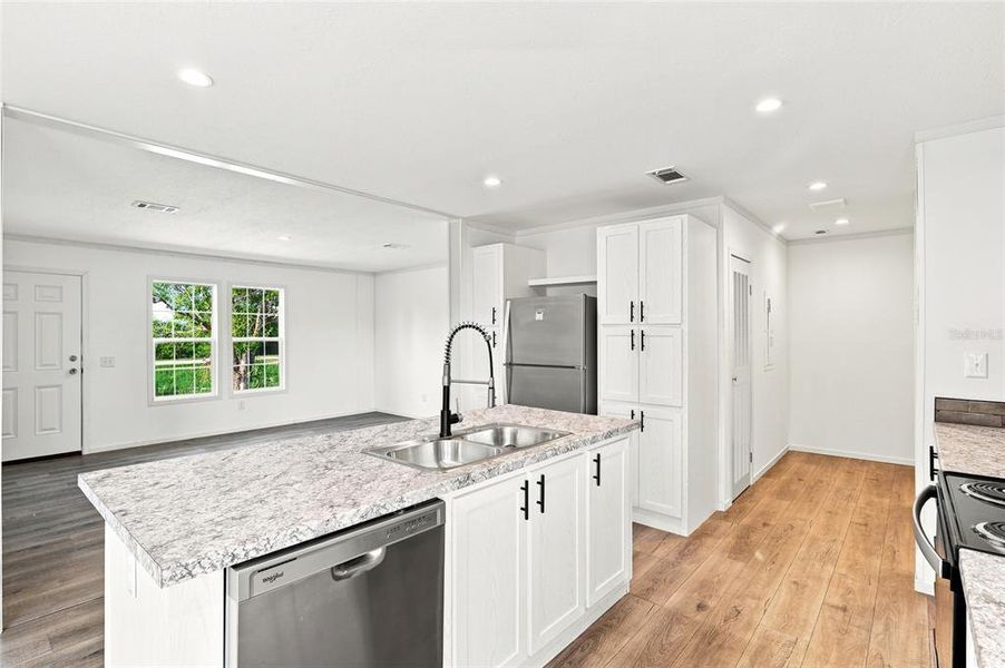 Furnished interior view inside a new home in , Okeechobee (Image 9).