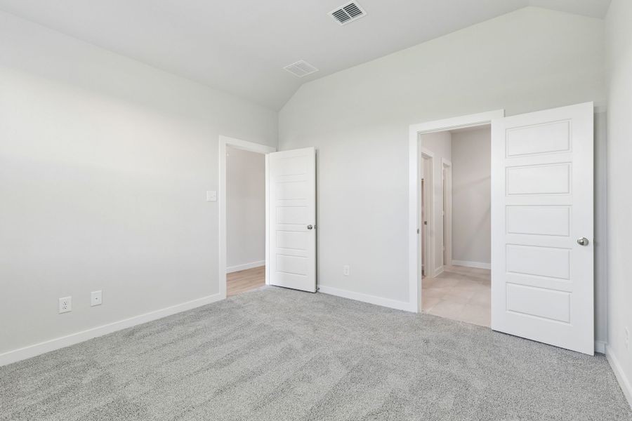 Primary Suite in the Cypress home plan by Trophy Signature Homes - REPRESENTATIVE PHOTO