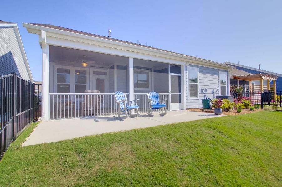 Exterior details and patio area of a home in Cresswind Charleston, Summerville (Image 32).