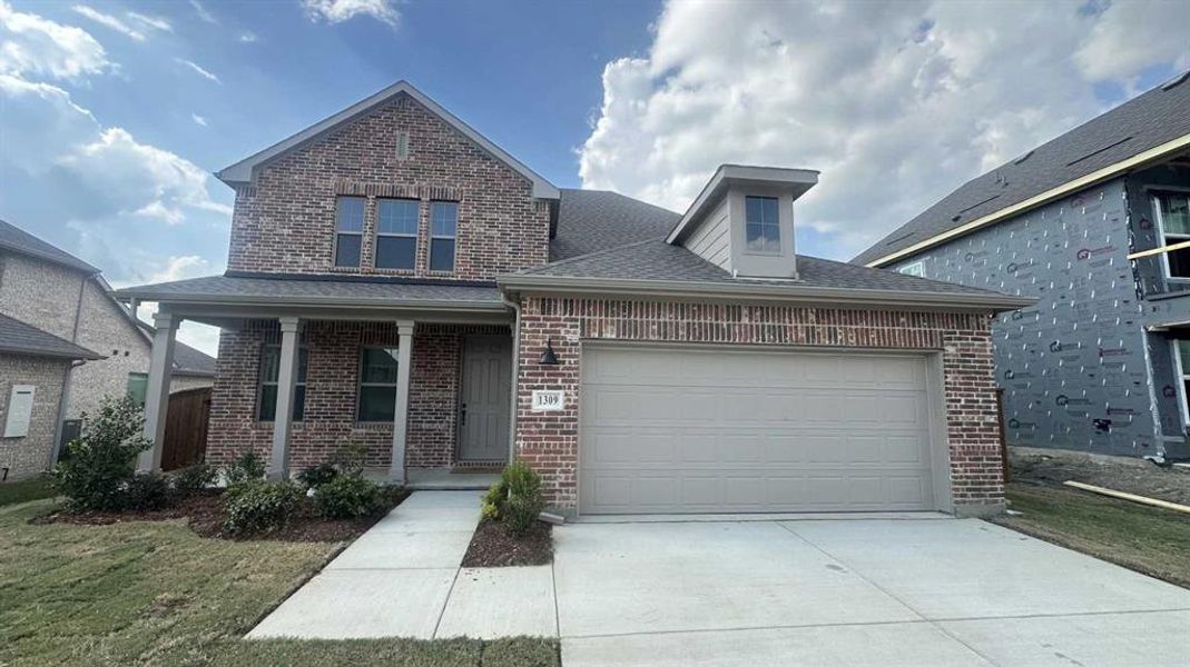 Front exterior of a new home in Gateway Parks, Forney, TX, highlighting curb appeal (Image 19). Front exterior of a new home in Gateway Parks, Forney, TX, highlighting curb appeal (Image 19).