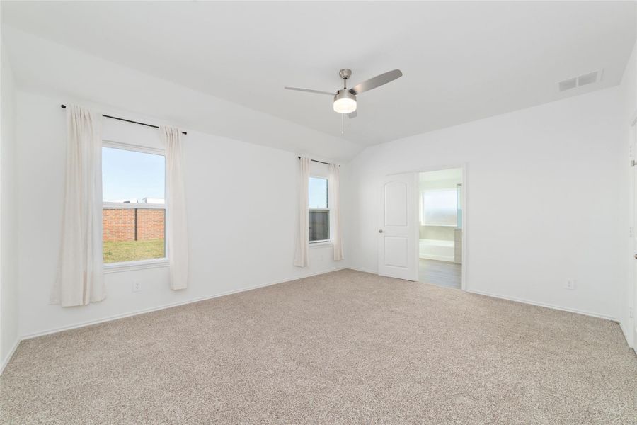Spacious, unfurnished interior of a new home in Sunterra, Katy (Image 23).