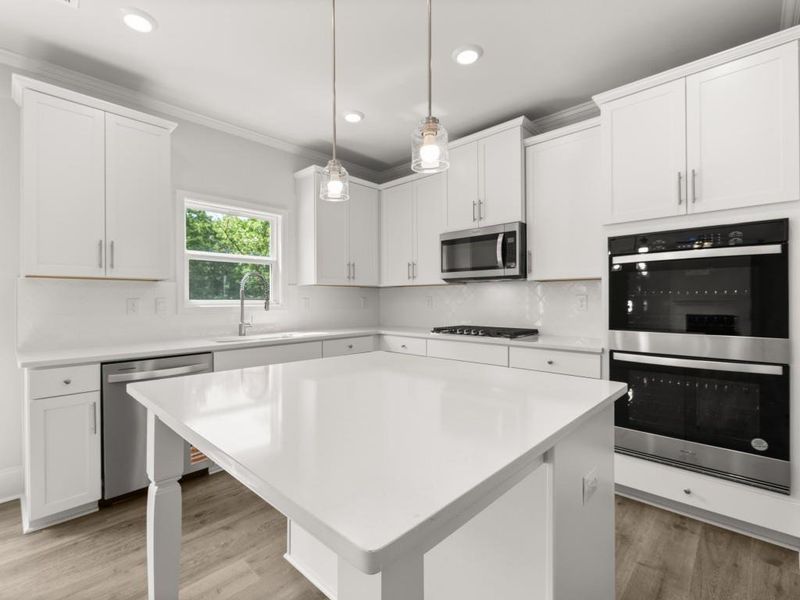 Furnished interior view inside a new home in Butner Estates, College Park (Image 6).