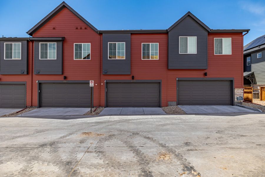 Front exterior of a new home in Arras Park, Thornton, CO, highlighting curb appeal (Image 16).