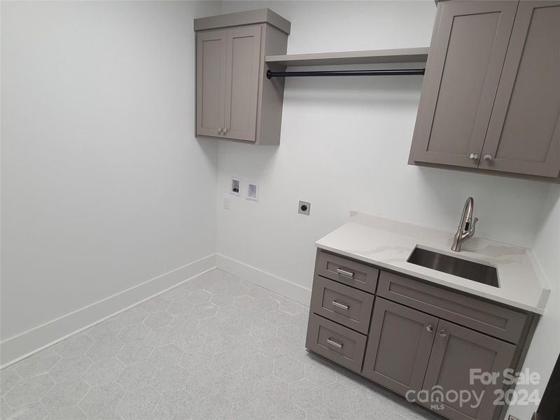 Laundry room with sink
