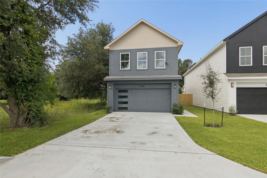 Front exterior of a new home in , Houston, TX, highlighting curb appeal (Image 1). Front exterior of a new home in , Houston, TX, highlighting curb appeal (Image 1).