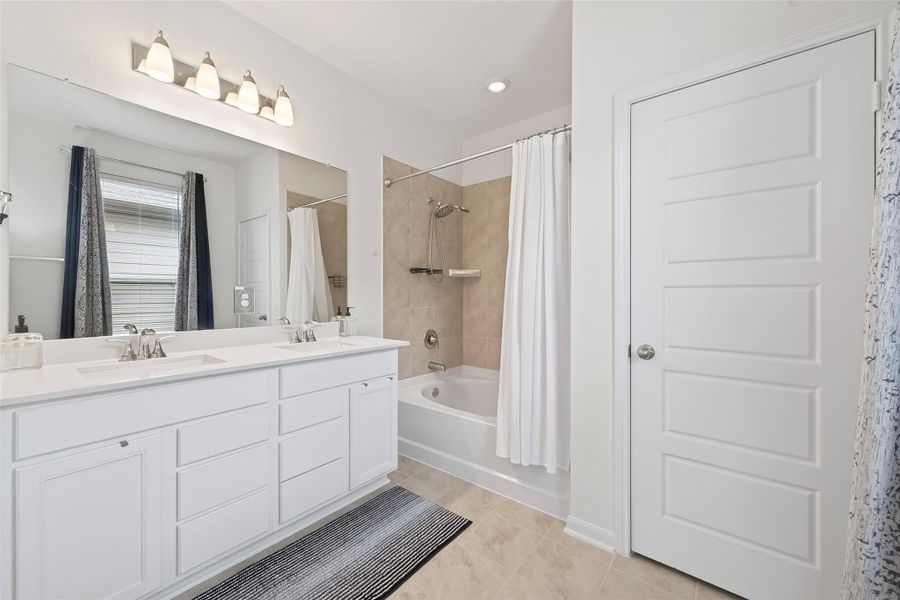 Primary bath features a shower/tub combo!