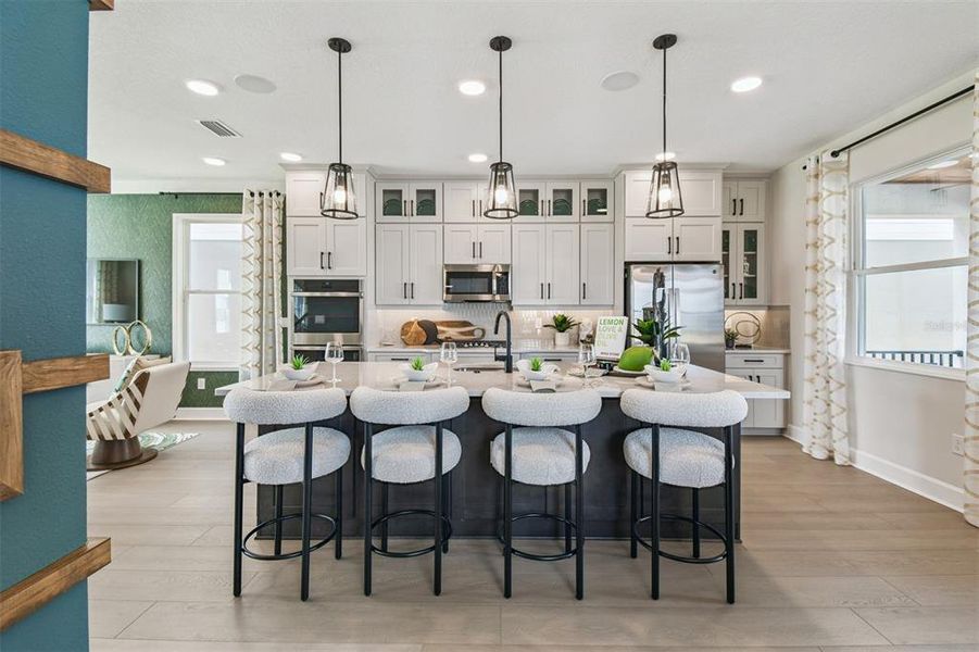 Furnished interior view inside a new home in Lake Star at Ovation, Winter Garden (Image 8).