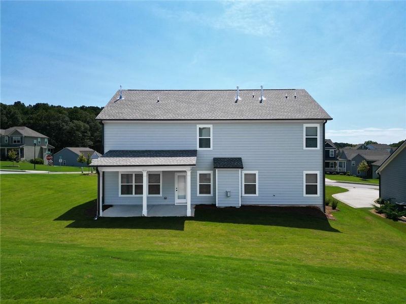 Exterior details and patio area of a home in Calgary Downs, Winder (Image 3).
