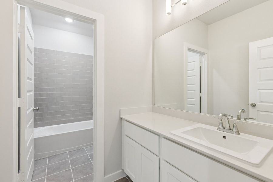 Bathroom in the Masters home plan by Trophy Signature Homes – REPRESENTATIVE PHOTO Bathroom in the Masters home plan by Trophy Signature Homes – REPRESENTATIVE PHOTO