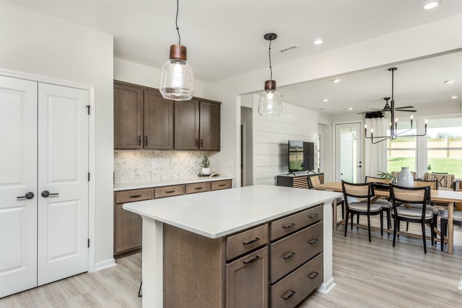 Representative furnished interior of a home built from the Alpine - Passport by Del Webb in Carolina Overlook, Clayton (Image 5). Representative furnished interior of a home built from the Alpine - Passport by Del Webb in Carolina Overlook, Clayton (Image 5).