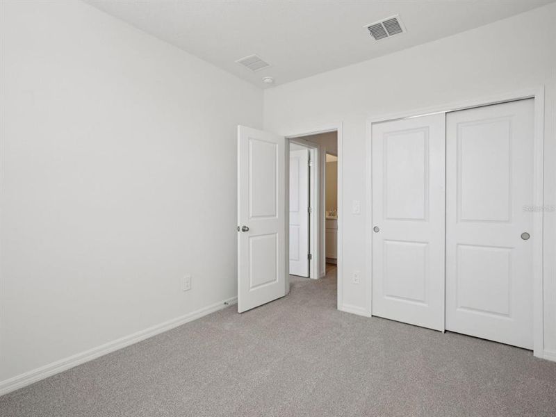 Spacious, unfurnished interior of a new home in Coasterra - Reserve Series, Palmetto (Image 39).