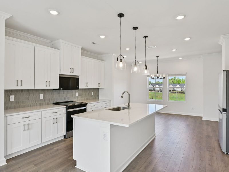 Furnished interior view inside a new home in Meadows at Wilson Farms - The Heights Series, Fort Mill (Image 3). Furnished interior view inside a new home in Meadows at Wilson Farms - The Heights Series, Fort Mill (Image 3).