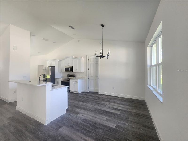 Furnished interior view inside a new home in , Dunnellon (Image 8).