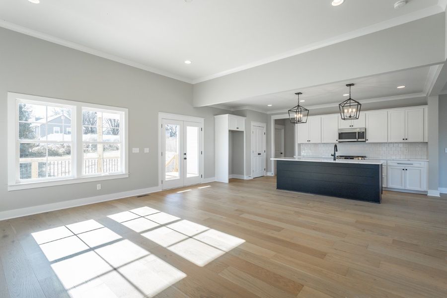 Representative furnished interior of a home built from the Carolina A by Riverstone Construction, LLC in Creekside, Cleveland (Image 8).