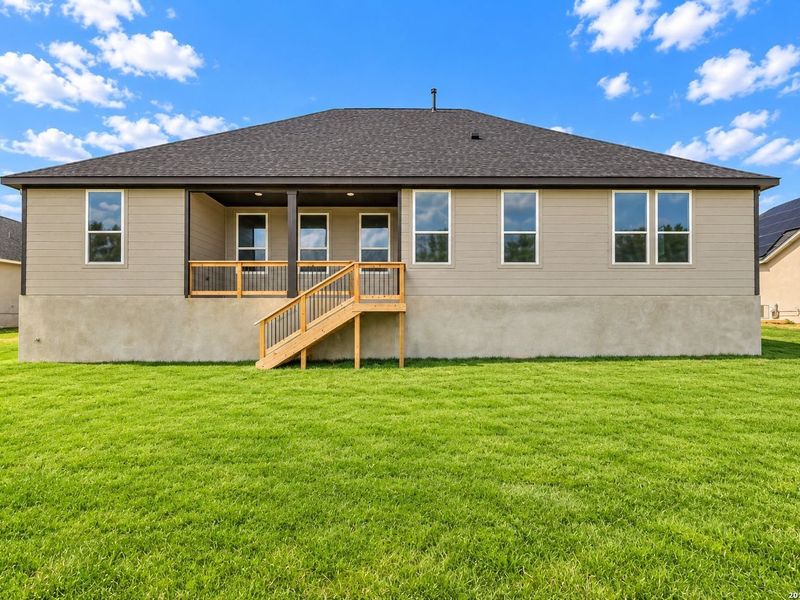 Exterior details and patio area of a home in Potranco Oaks, Castroville (Image 28).