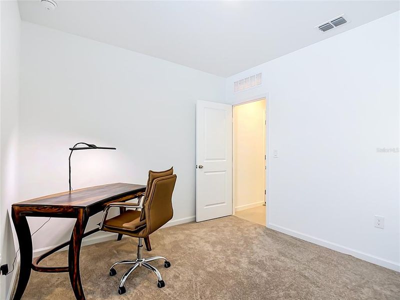 Furnished interior view inside a new home in Caloosa Cove, Labelle (Image 6).