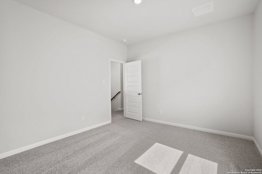 Spacious, unfurnished interior of a new home in Melissa Ranch, San Antonio (Image 17).