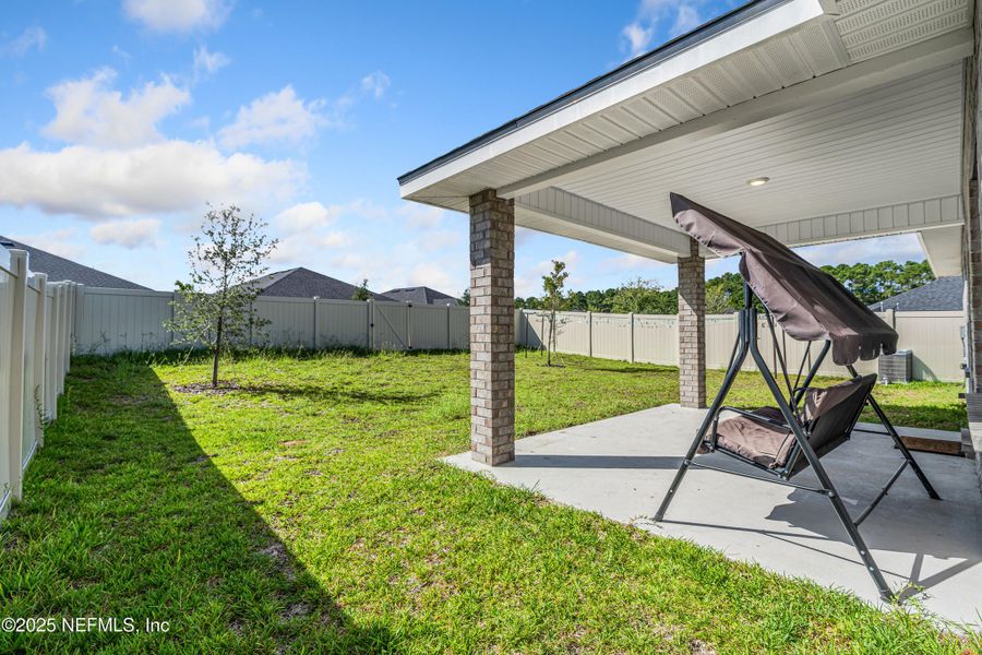 Front exterior of a new home in Shadow Crest at Rolling Hills, Green Cove Springs, FL, highlighting curb appeal (Image 23).