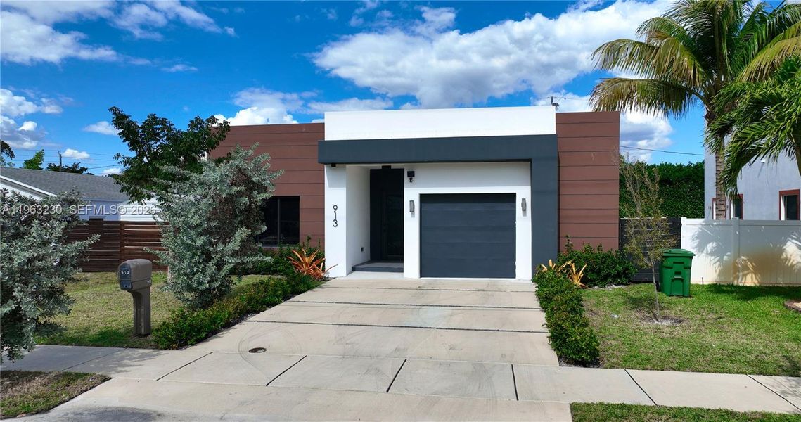 Front exterior of a new home in , Fort Lauderdale, FL, highlighting curb appeal (Image 1). Front exterior of a new home in , Fort Lauderdale, FL, highlighting curb appeal (Image 1).