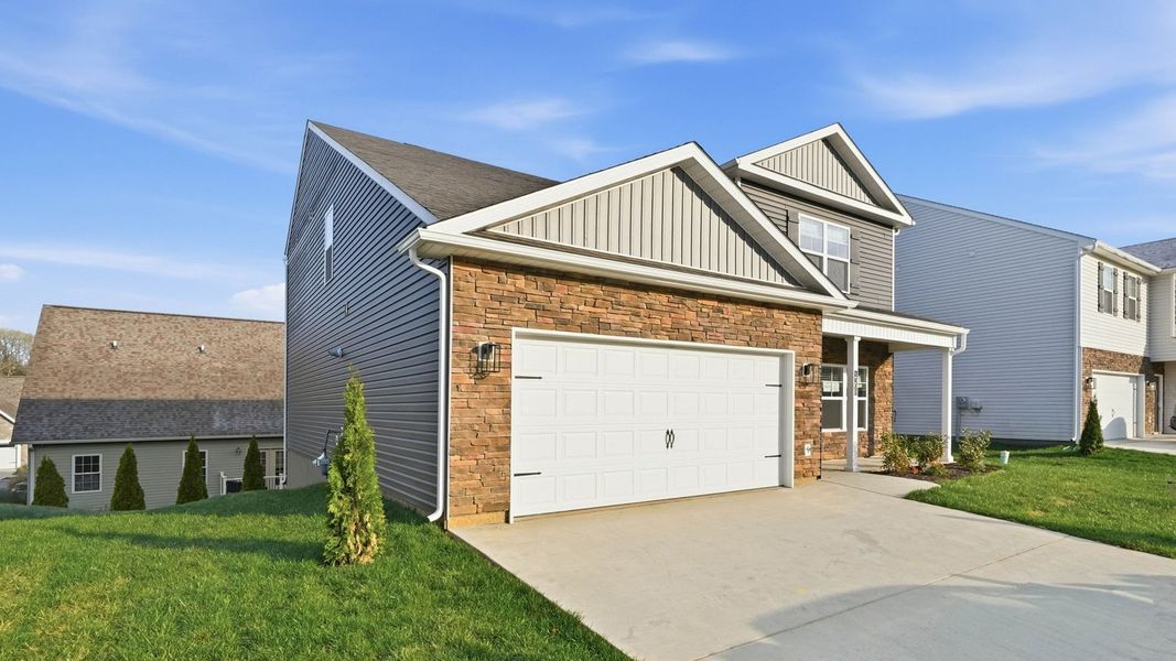 Front exterior of a new home in Polo Fields, Kingsport, TN, highlighting curb appeal (Image 18).