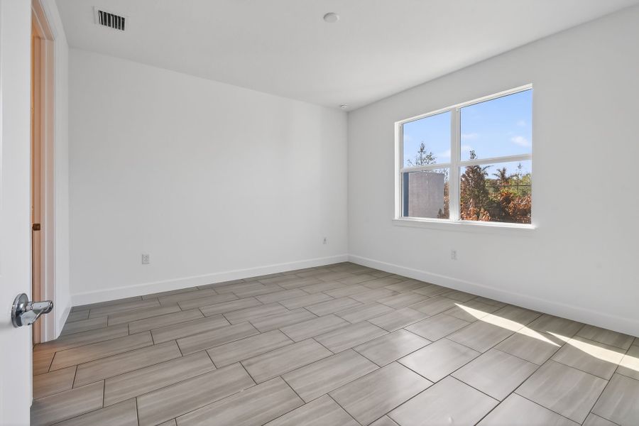 Spacious, unfurnished interior of a new home in Costa Pointe, Vero Beach (Image 45).