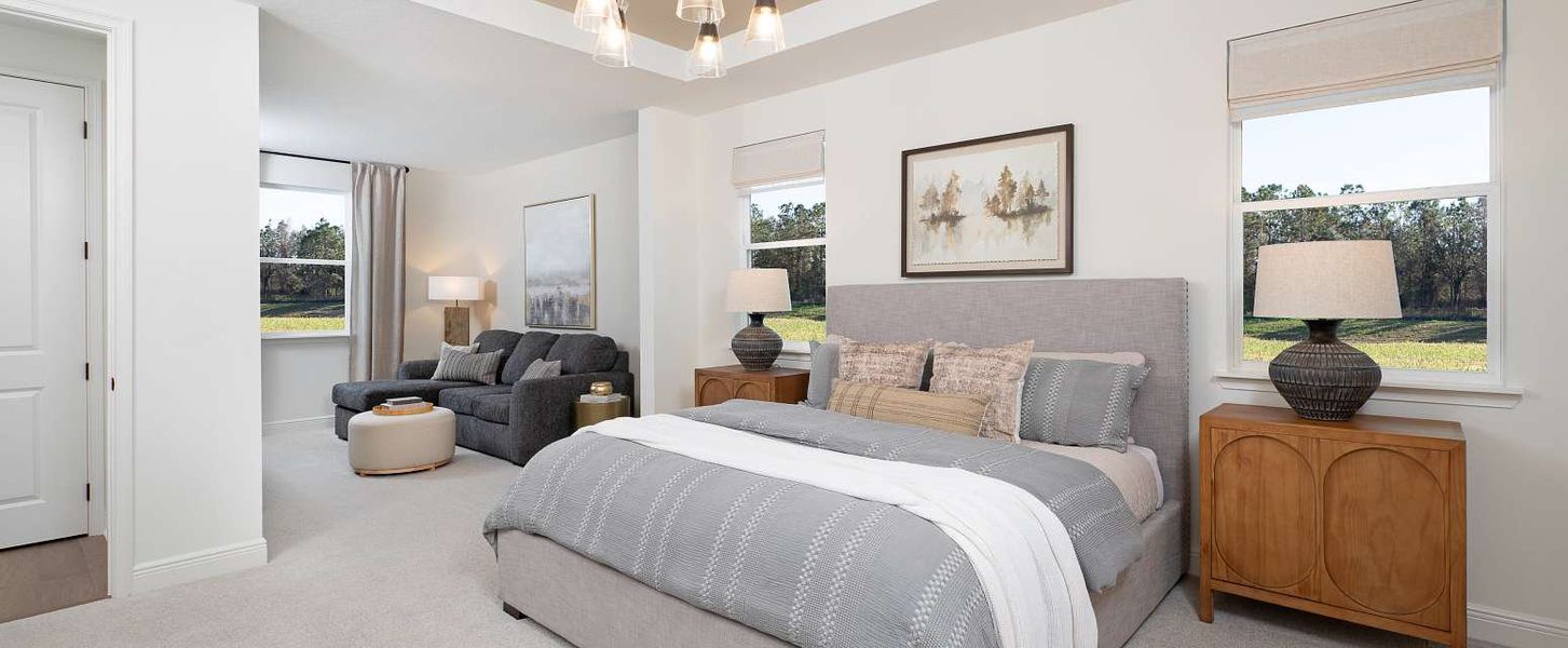 Furnished interior in a model home at Oakfield Trails Traditional in Parrish (Image 18).