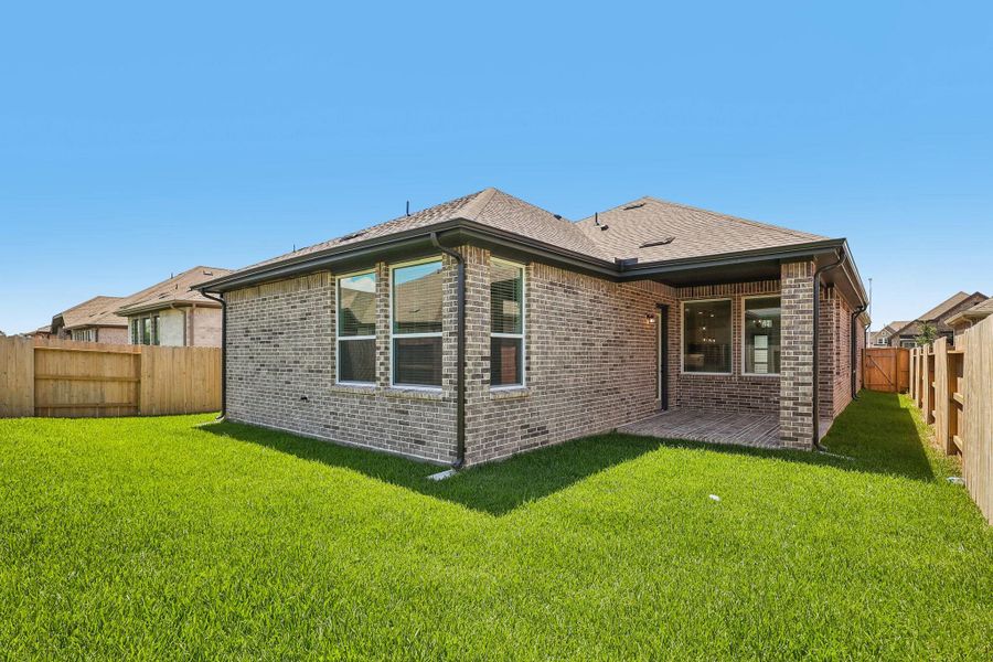 Exterior details and patio area of a home in Wood Leaf Reserve, Tomball (Image 4). Exterior details and patio area of a home in Wood Leaf Reserve, Tomball (Image 4).