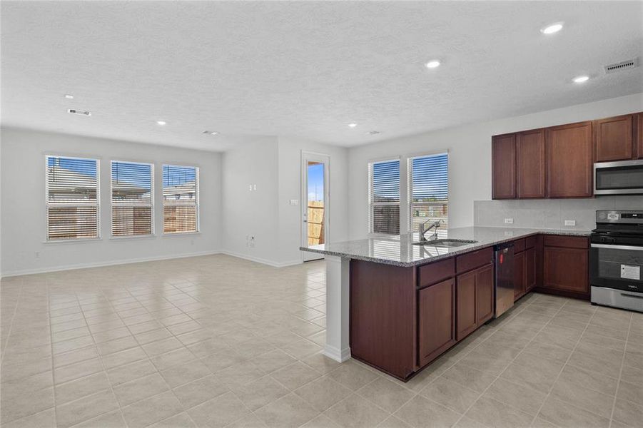 Another view of the Great Room featuring the beautiful tile flooring.