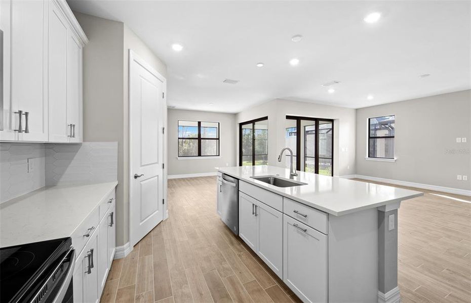 Furnished interior view inside a new home in Cedar Grove at The Woodlands, North Port (Image 5).