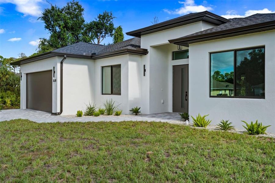 Exterior details and patio area of a home in , North Port (Image 34).