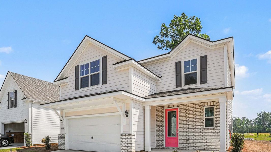 Representative exterior photo of a completed home built from the Mackenzie2 by D.R. Horton in Chapman Village, Conway, SC (Image 12).