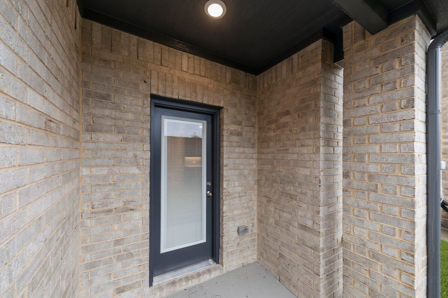 Front exterior of a new home in Sereno Oaks, Dallas, TX, highlighting curb appeal (Image 29). Front exterior of a new home in Sereno Oaks, Dallas, TX, highlighting curb appeal (Image 29).